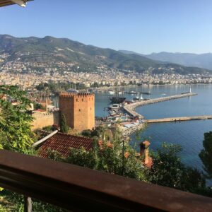 a building next to a body of water